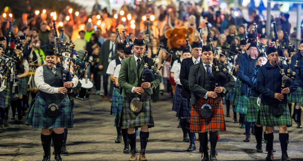 Processrion at opening of Royal National Mòd Loch Abar 2025